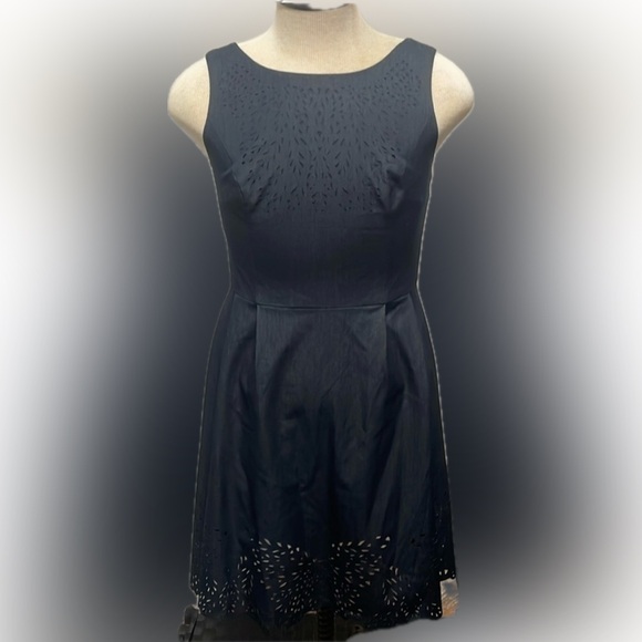 Betsey Johnson Dresses & Skirts - Betsy Johnson dress size 12  with eyelet rimmed bottom decoration